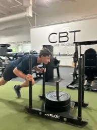 man in black hoodie standing