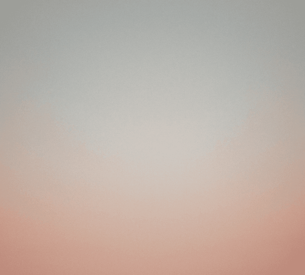 a view of a mountain covered in clouds