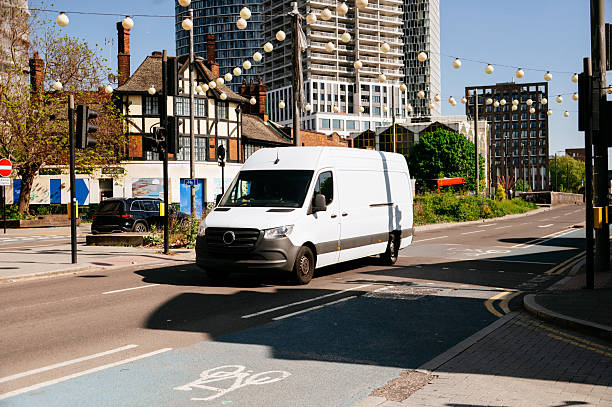 image of a Lwb van driving along a UK urban road