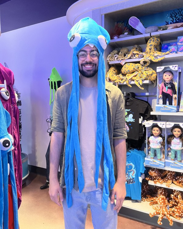 Taha trying on a hat