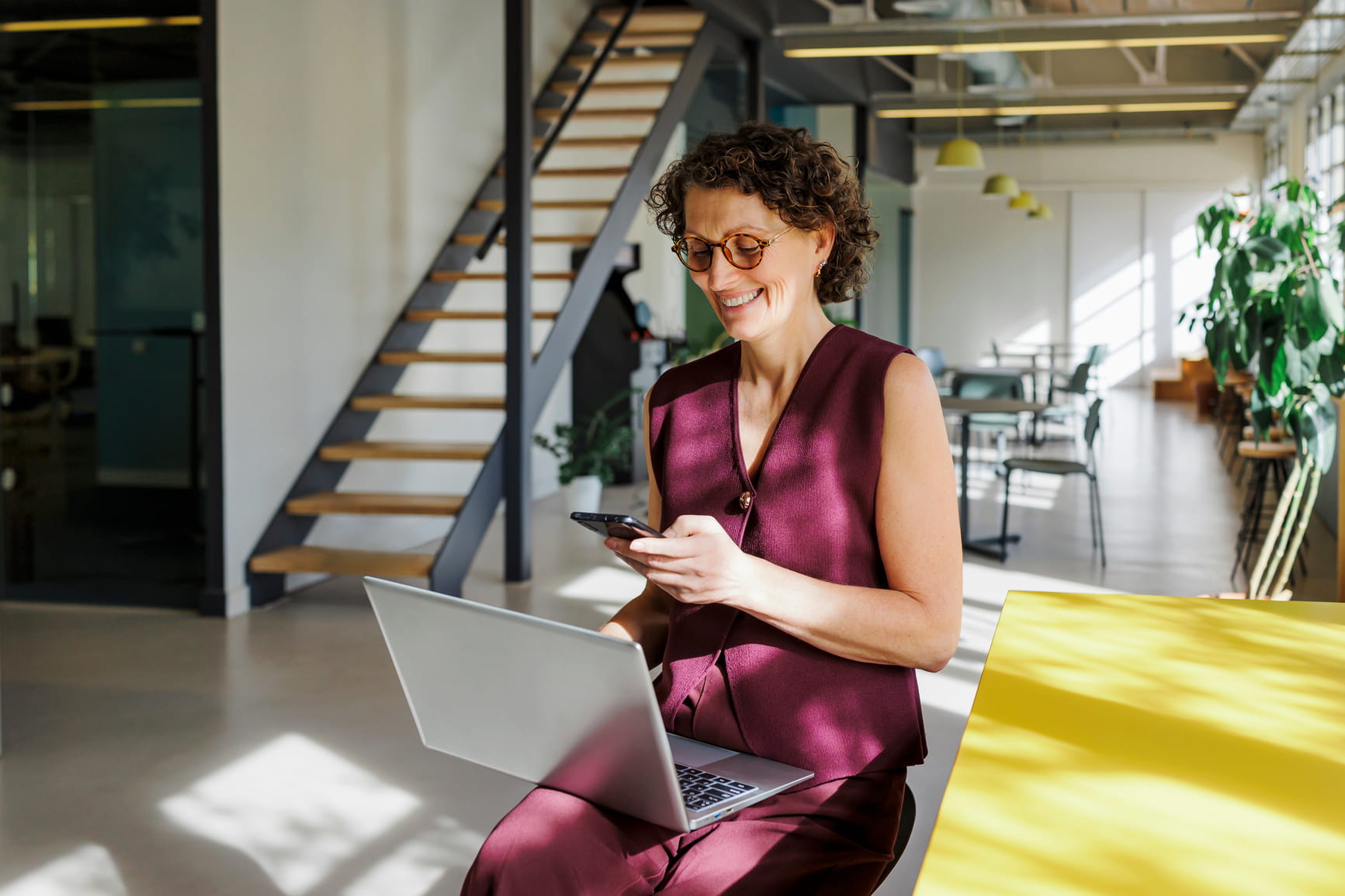 Business woman checking phone