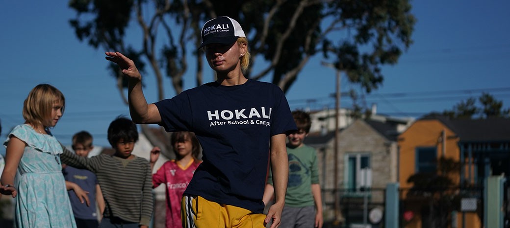 Students practicing K-pop choreography during after school dance enrichment program