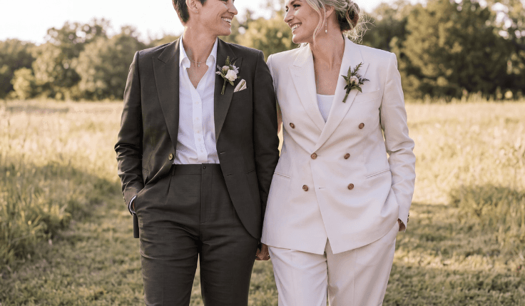 Queer wedding couple wearing contrasting shawl-lapel and double-breasted bespoke suits