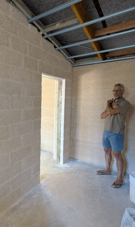 A review of a customer looking at a hemp block wall in their beautiful new hemp house