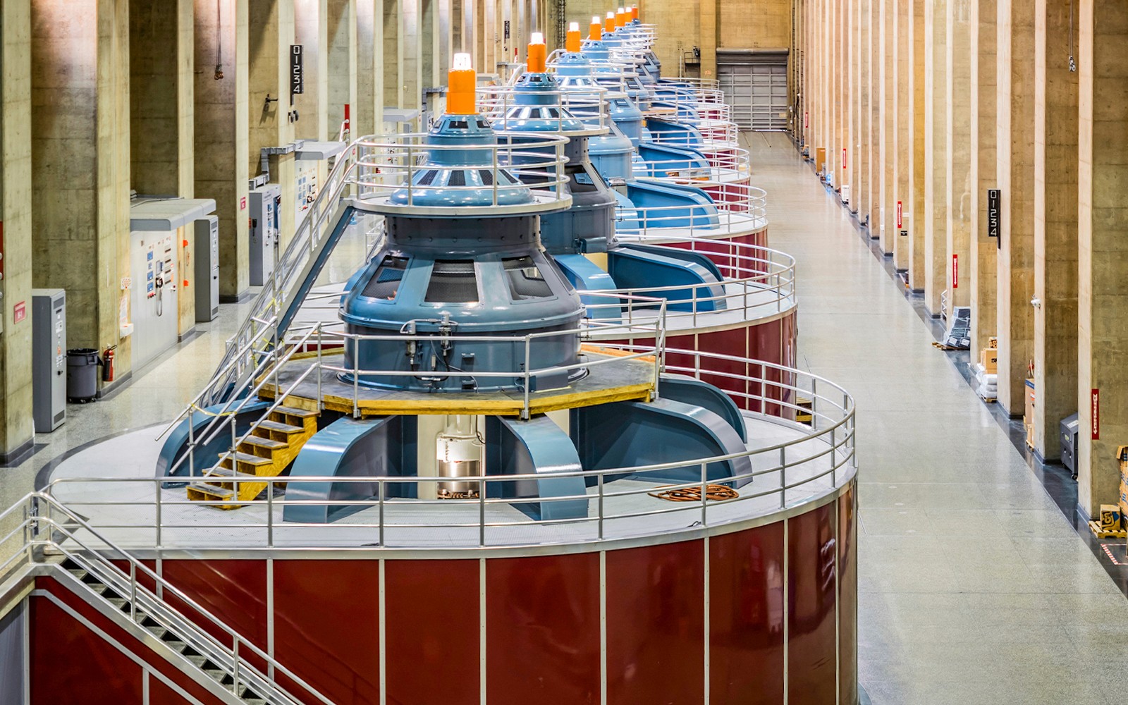 Visitors exploring Hoover Dam with a view of the dam's structure and surrounding landscape in Las Vegas.