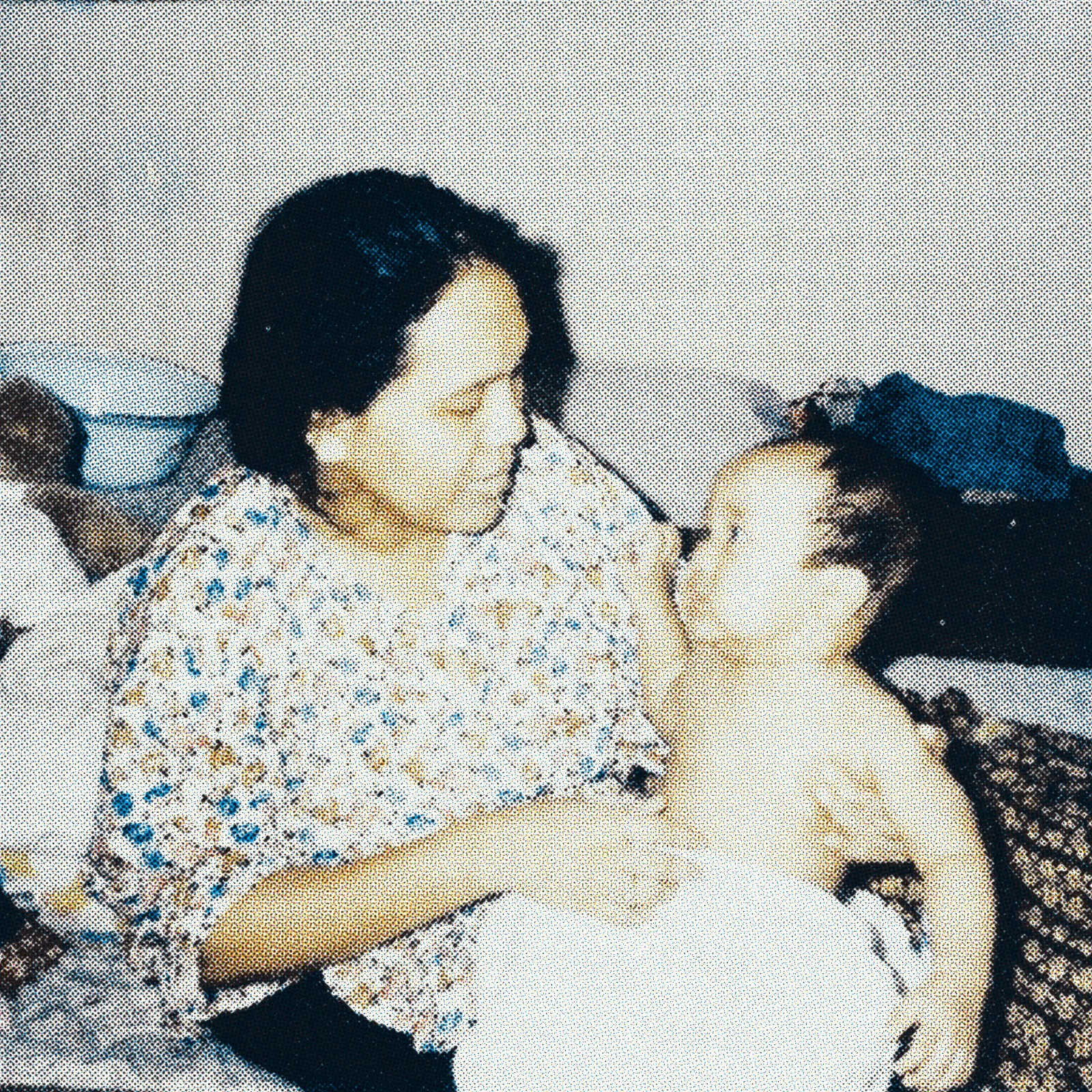 Photo of Zainul as a child with his mother
