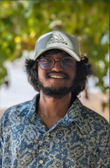 a group of women standing on top of a sandy beach