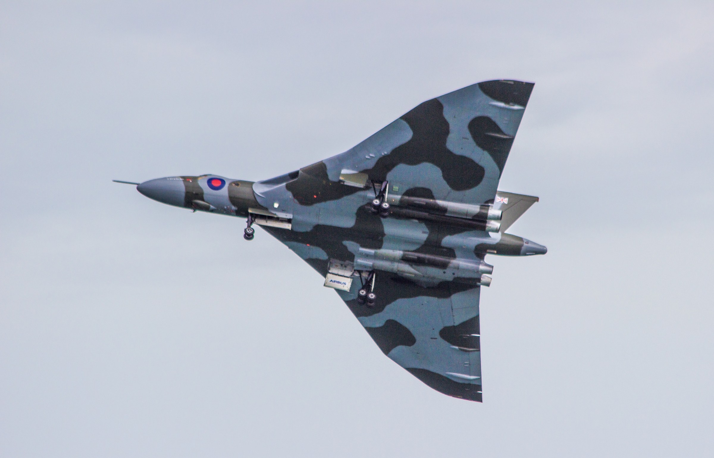EVENTS · A Vulcan bomber banking overhead.