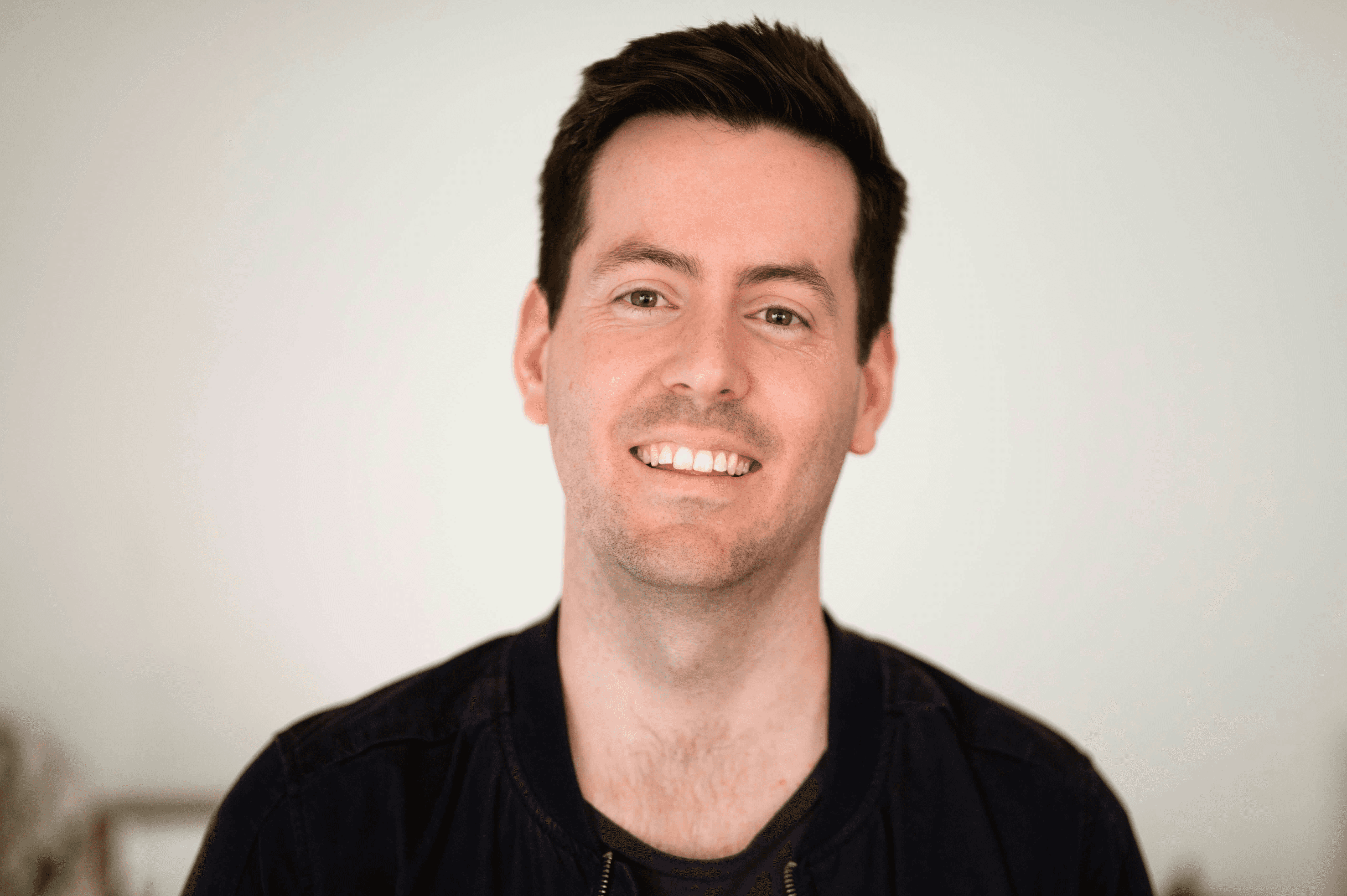 a man smiling for the camera