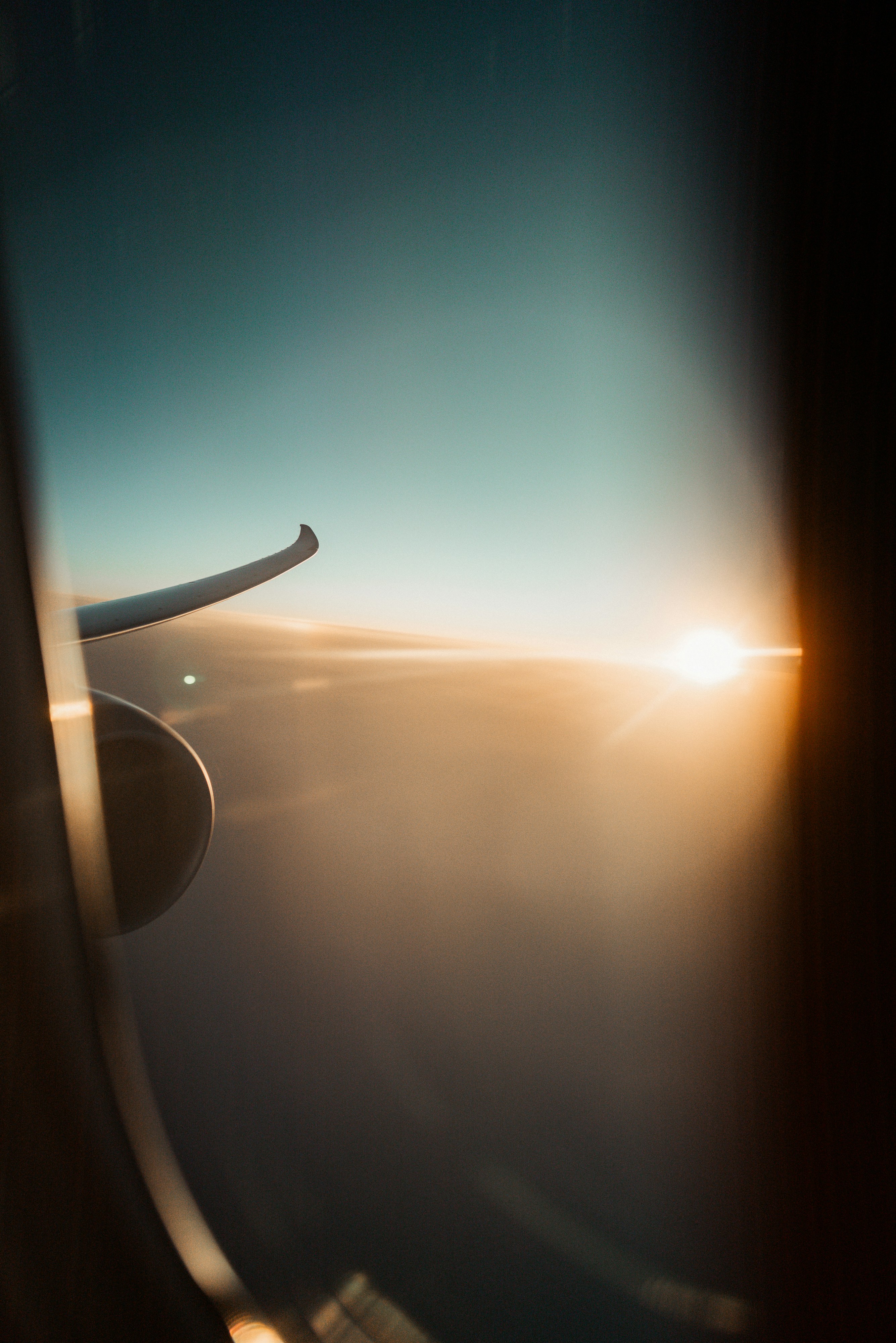 View of sun outside airplane window