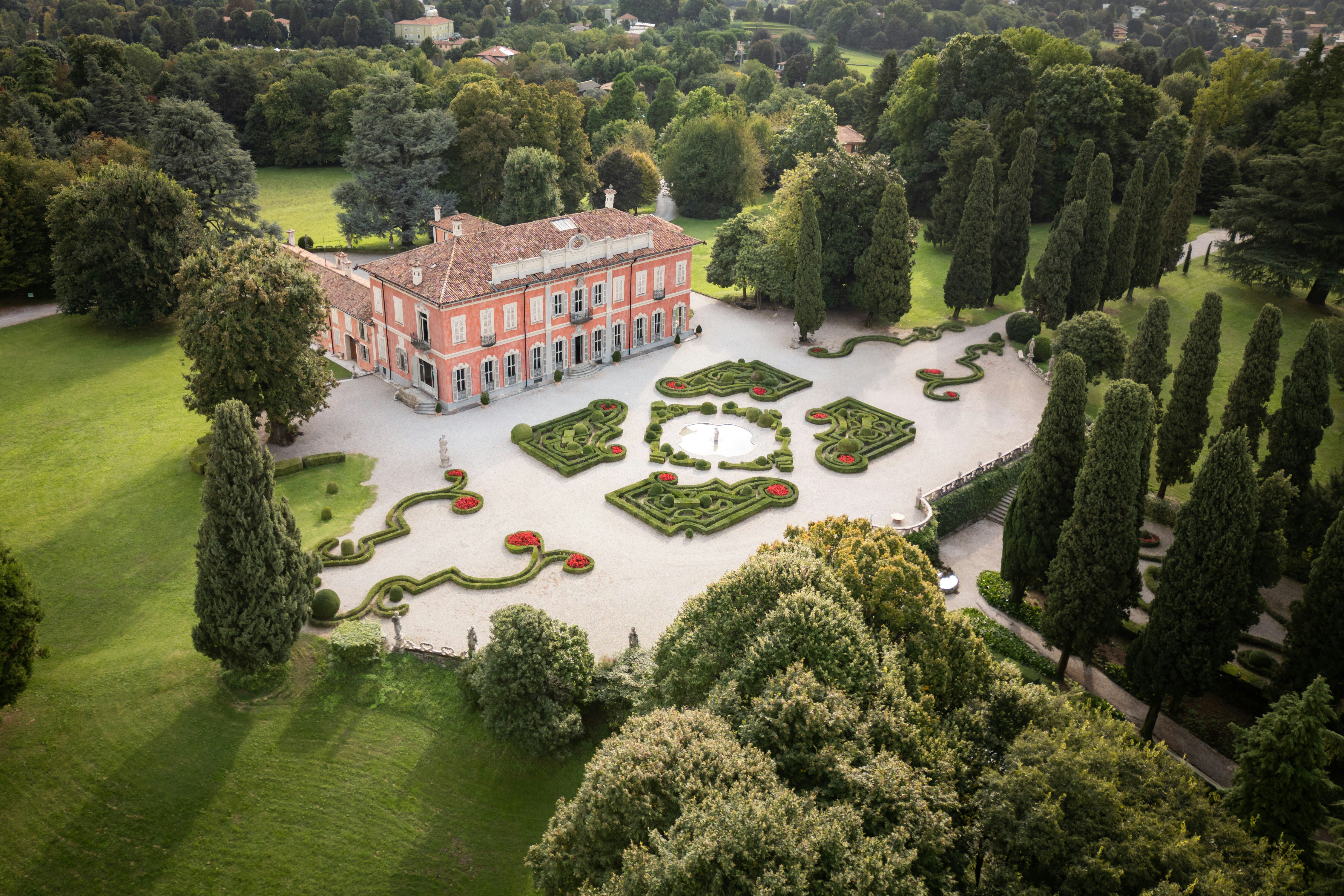 Grand historic villa with formal gardens and trees