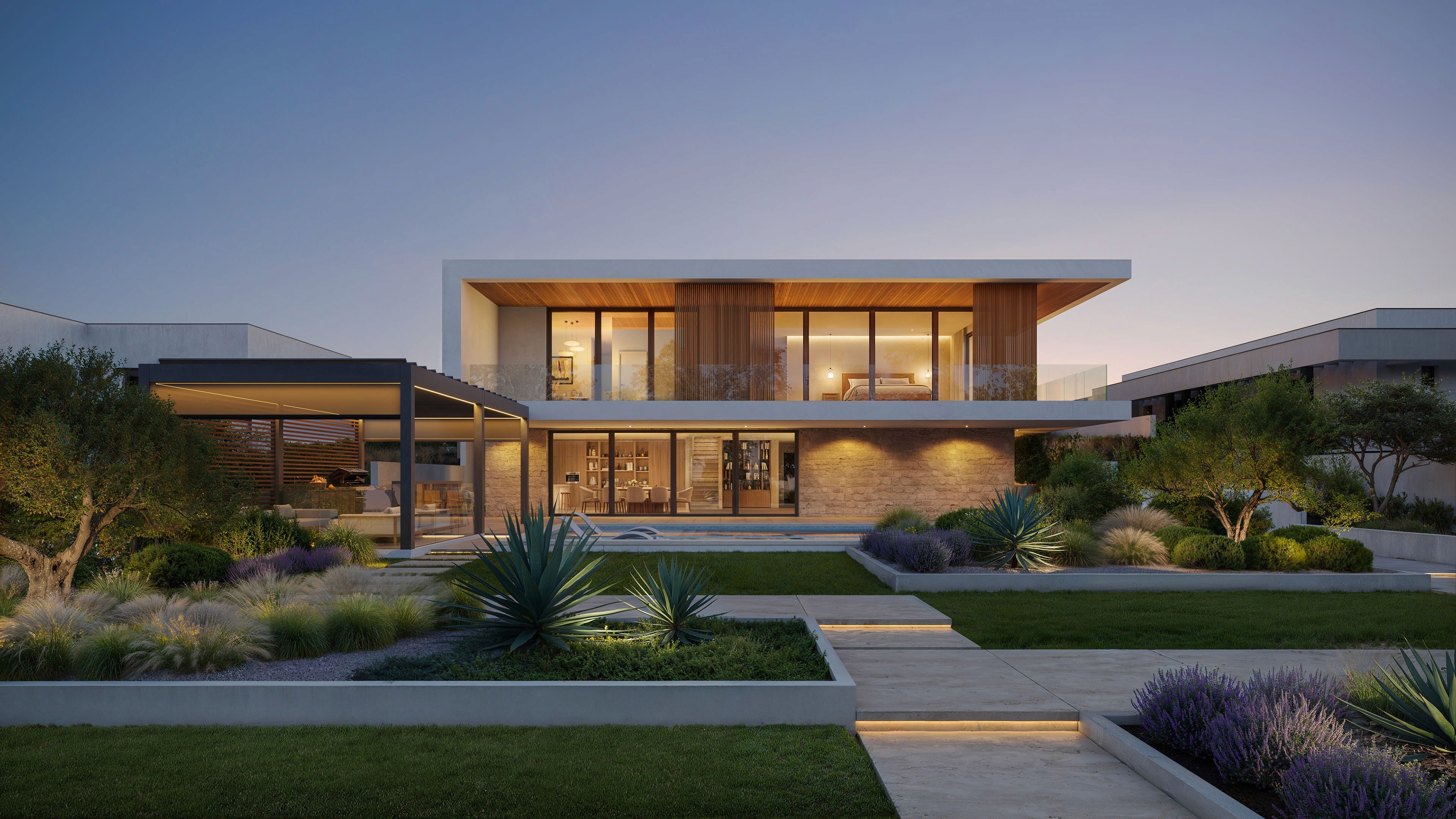 A modern custom home in Corona Del Mar with minimalist architecture designed by ARCA Builders. Smooth white facade, large windows, exterior lighting, set against a backdrop of an evening sky.