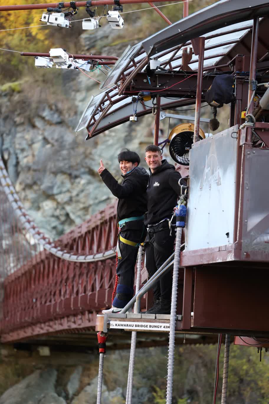 Person in a white off-shoulder top using a MacBook laptop, with text overlay 'What's new in digital?' and the fabrica® logo in the top corner.