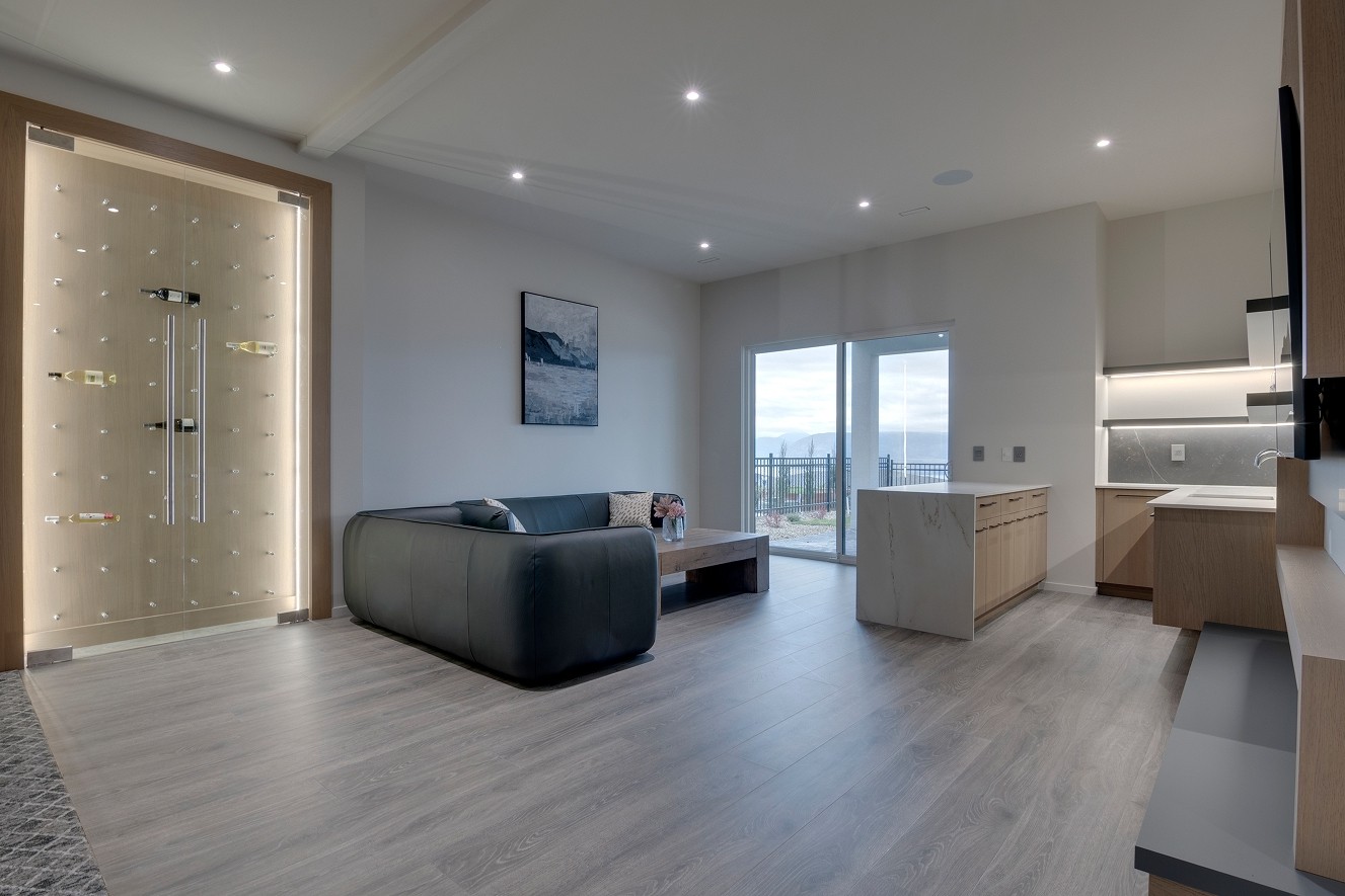 Modern living room with custom cabinetry and neutral tones