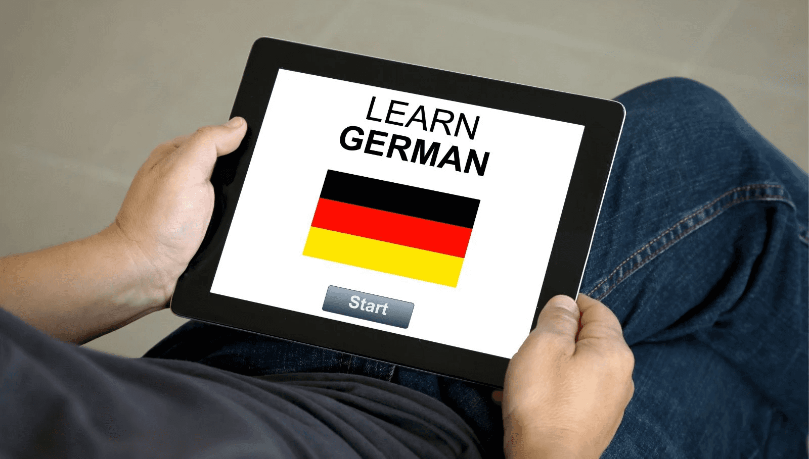  Person using tablet to learn German - Best Program to Learn German 