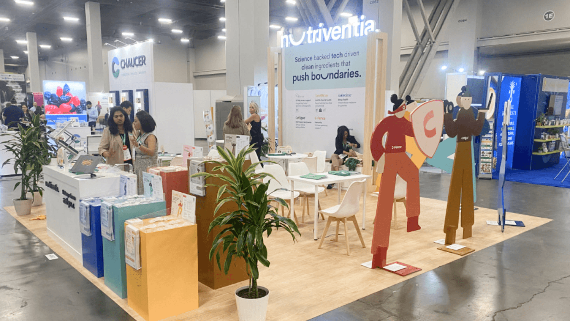 custom-built natural products trade show booth with sample counter, shelf display, and retail-style product presentation