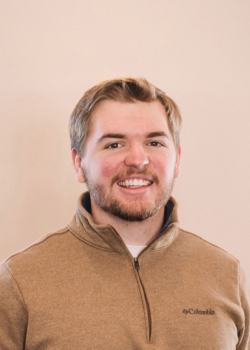 man using smartphone on chair