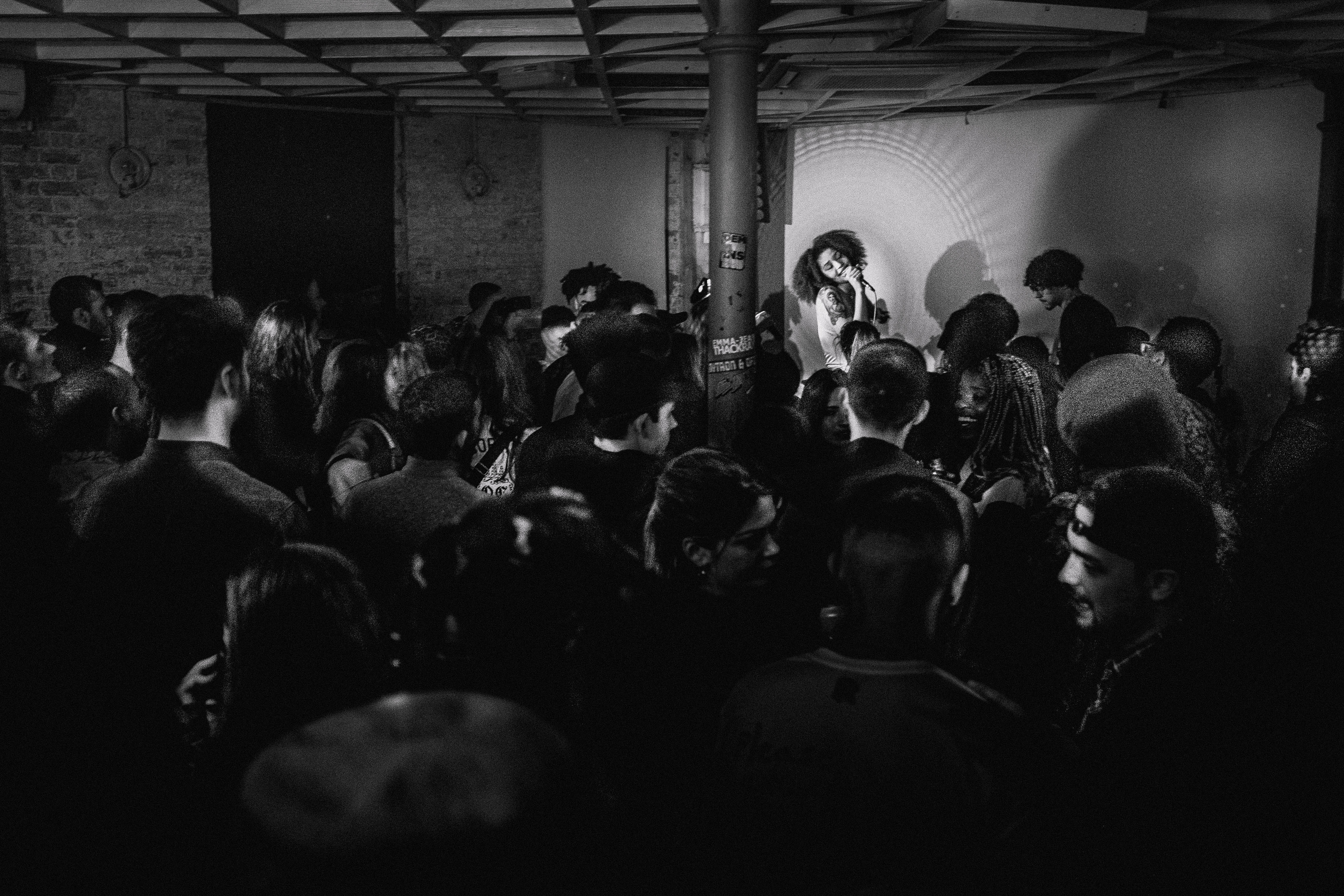 Root 73 collage featuring artists, performers and community moments.