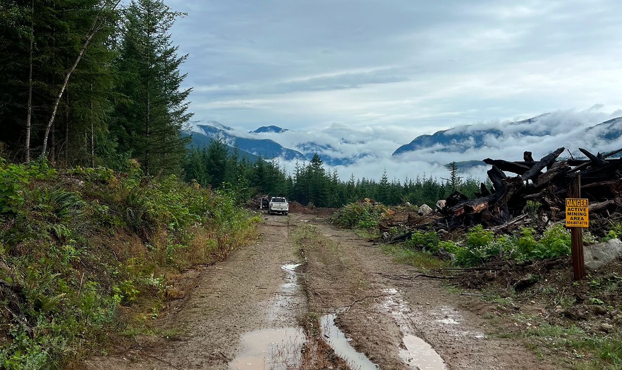 Forest service road access with drainage features at Statlu Resources aggregate operation site