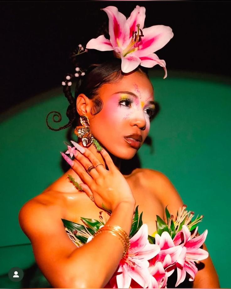Athletic man in a sleeveless black outfit posing confidently outdoors under a bright blue sky, with a close-up of navy and salmon-colored men’s running shoes in the foreground.