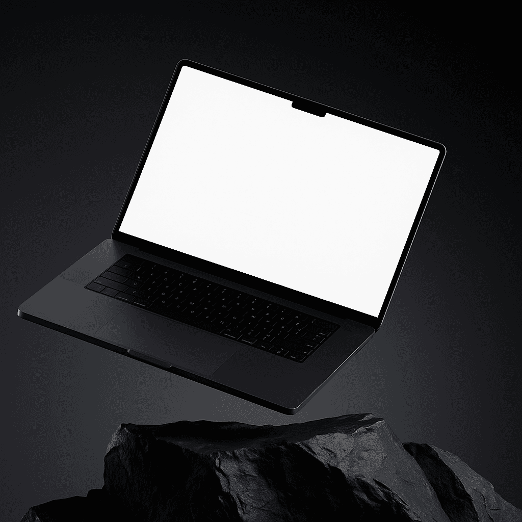 A black rock with a MacBook floating above it in grey space