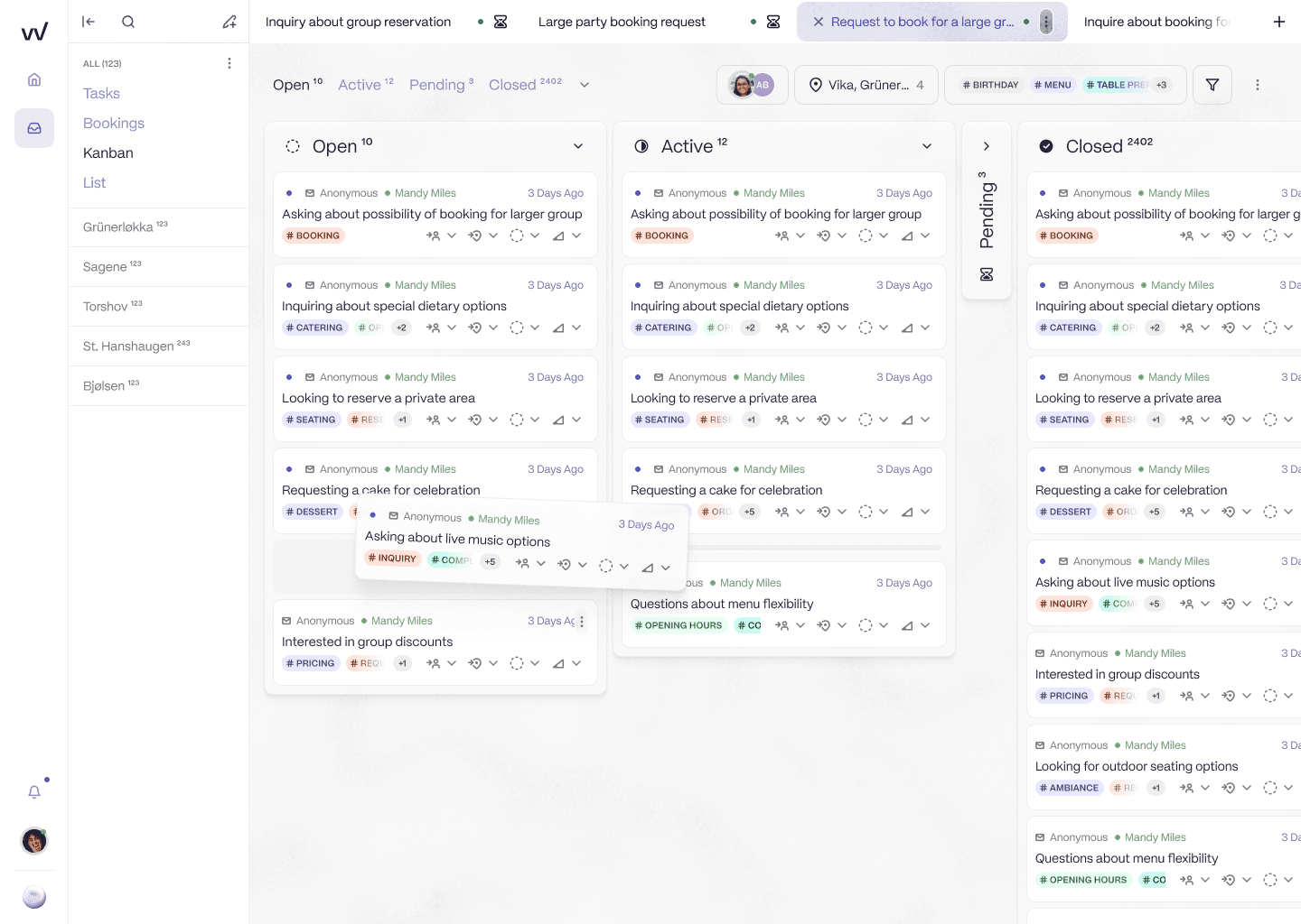 RevVue inbox kanban view with Open, Active, Pending, and Closed columns. The left sidebar lists multiple restaurant venues. Each ticket card shows guest name, enquiry summary, and category tags such as Booking, Complaint, Vegan.