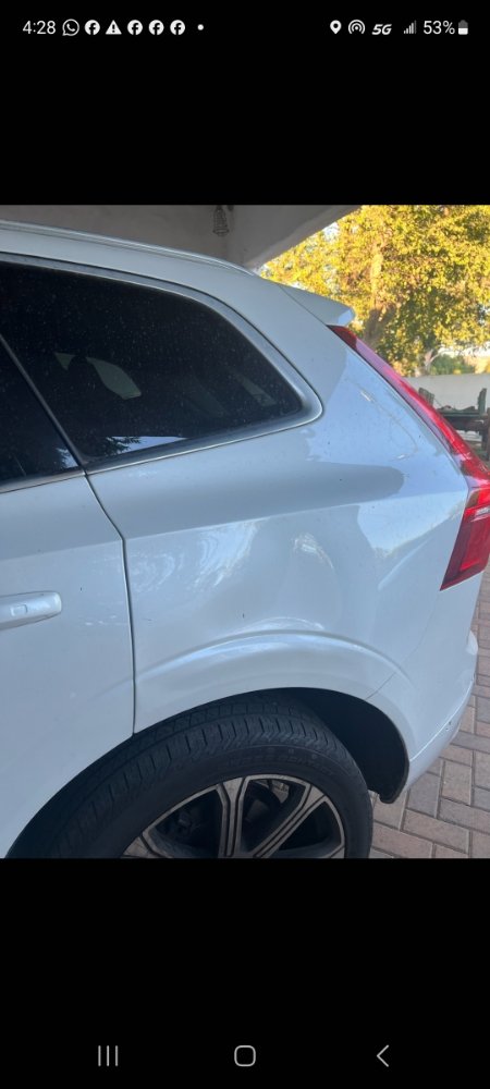 Volvo XC60 quarter panel dent repair