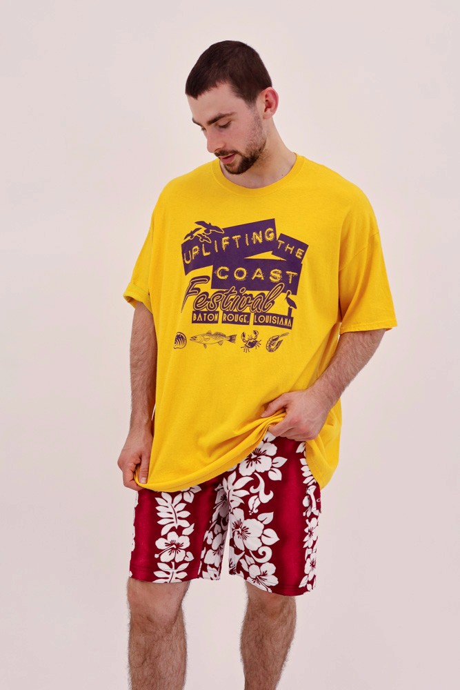 male model wearing yellow shirt