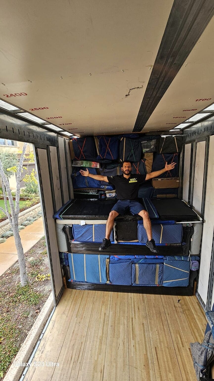 juan with well loaded truck after moving labor