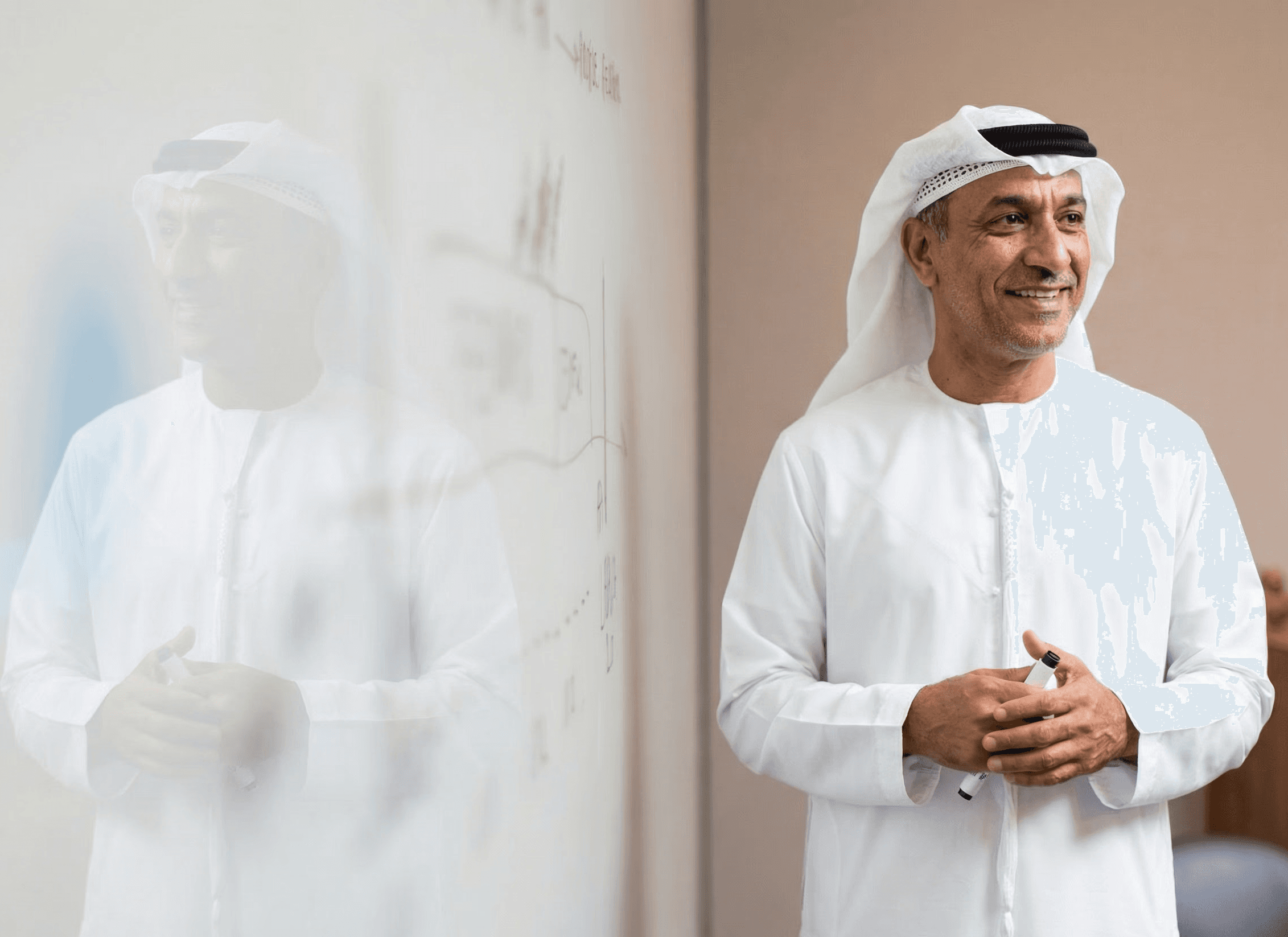 woman in blue tank top standing beside white wall
