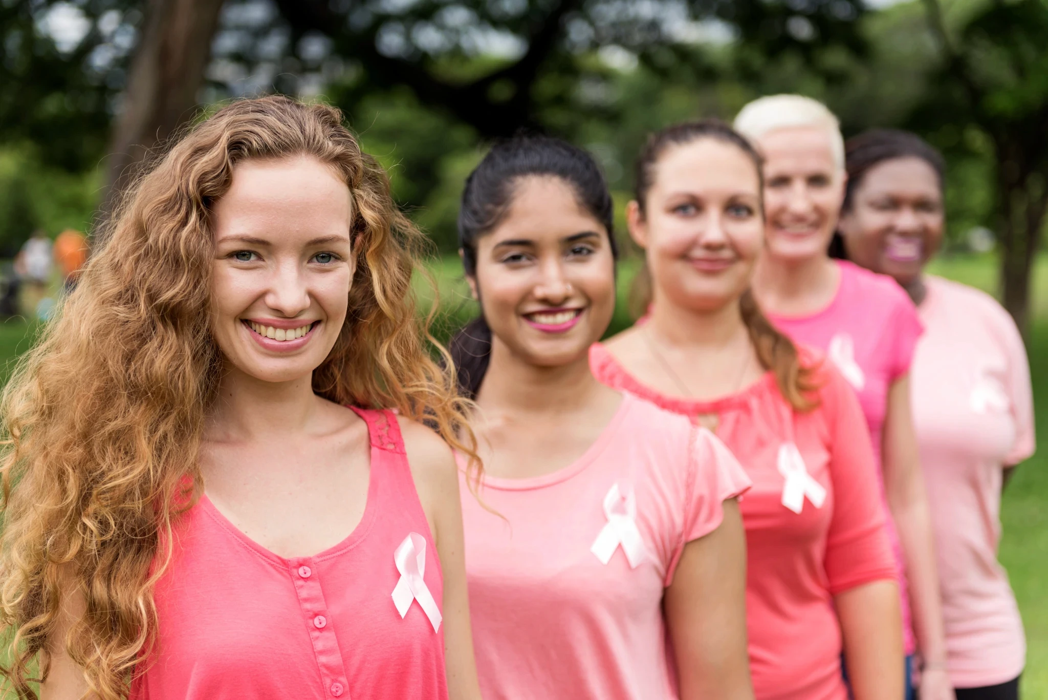 Group of diverse women being united for Breast Cancer