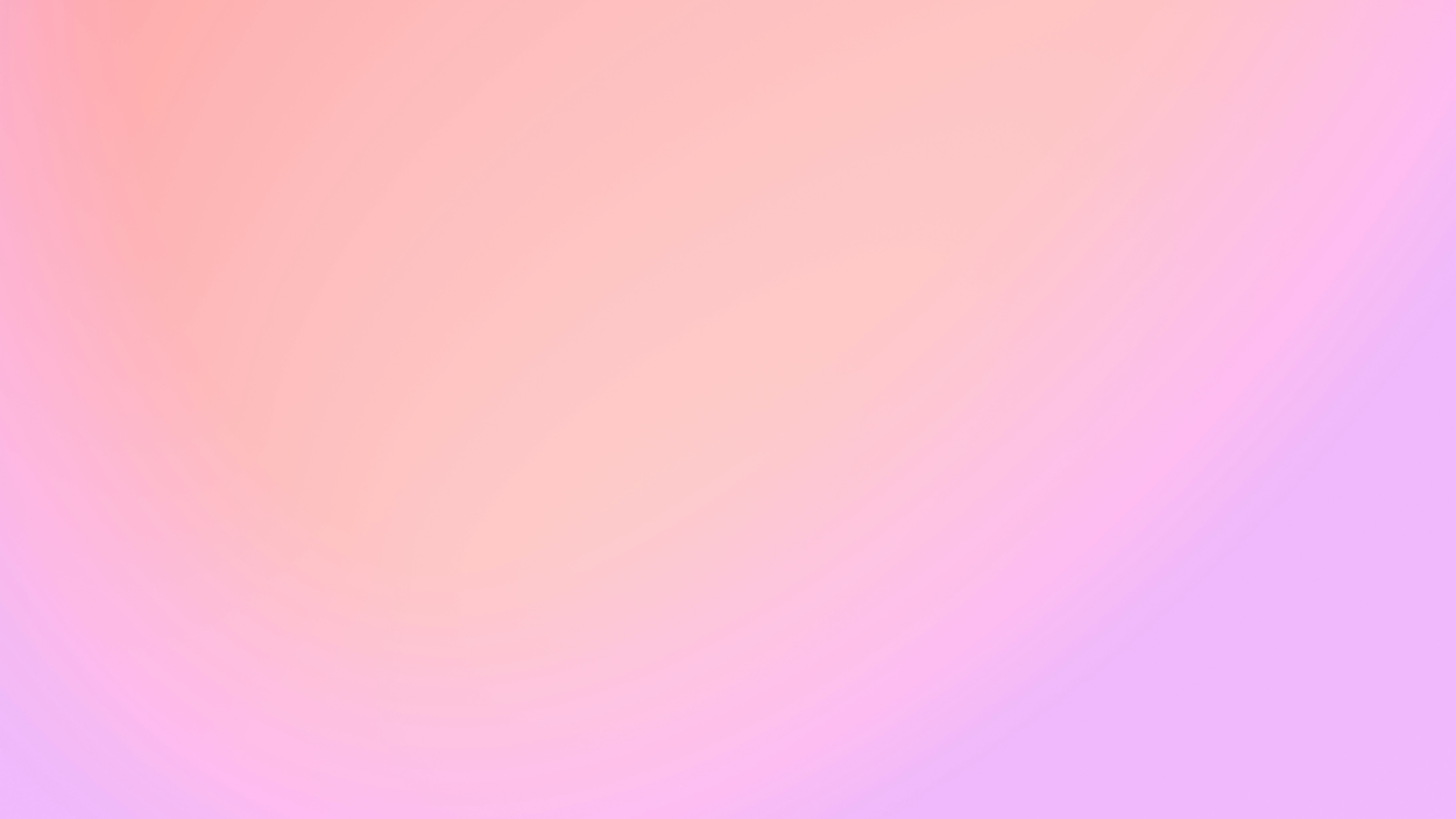 a blurry image of a pink and purple background