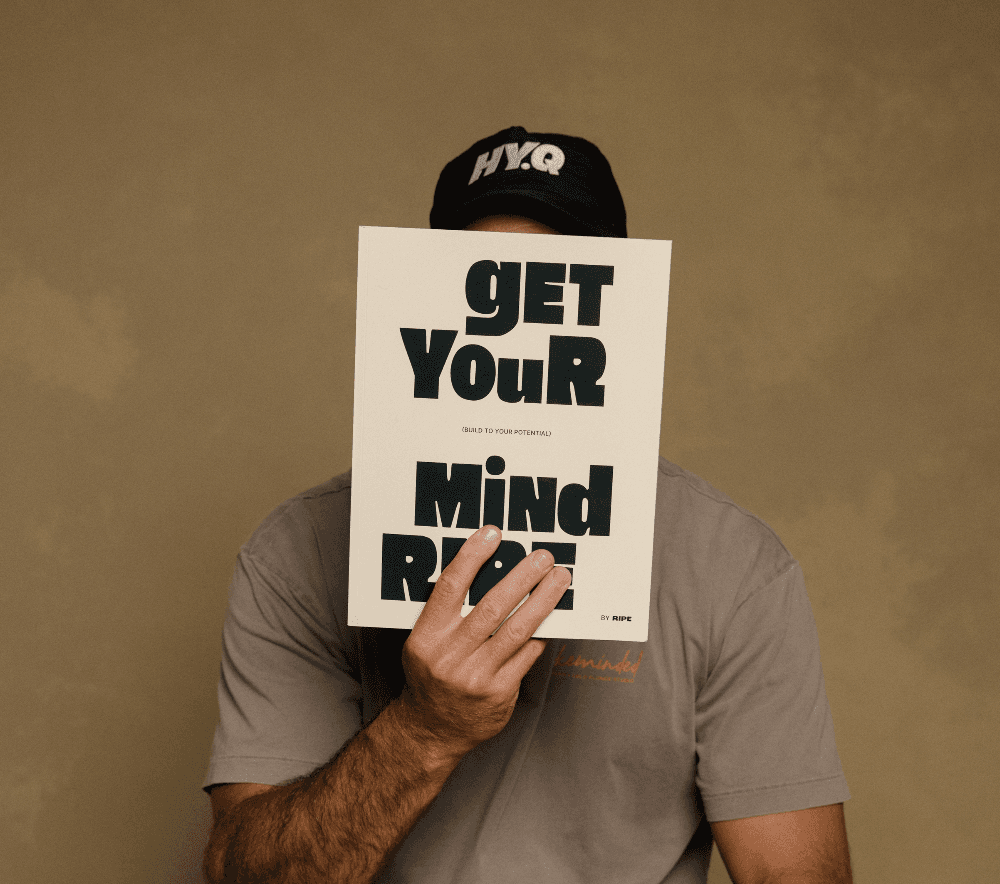 GYMR workbook spread with motivational typography and creative collage elements