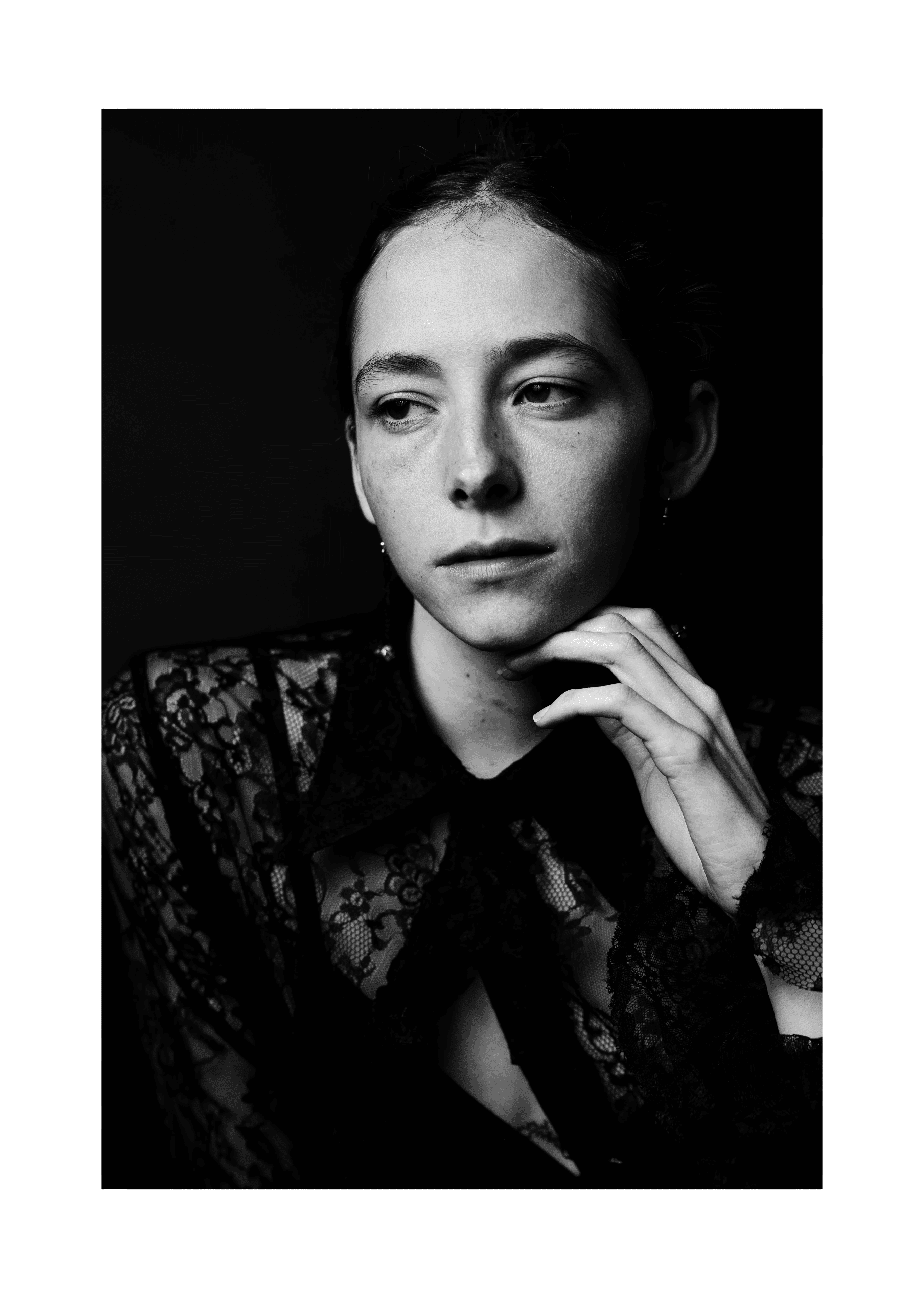 a blurry photo of a person standing in front of a wall