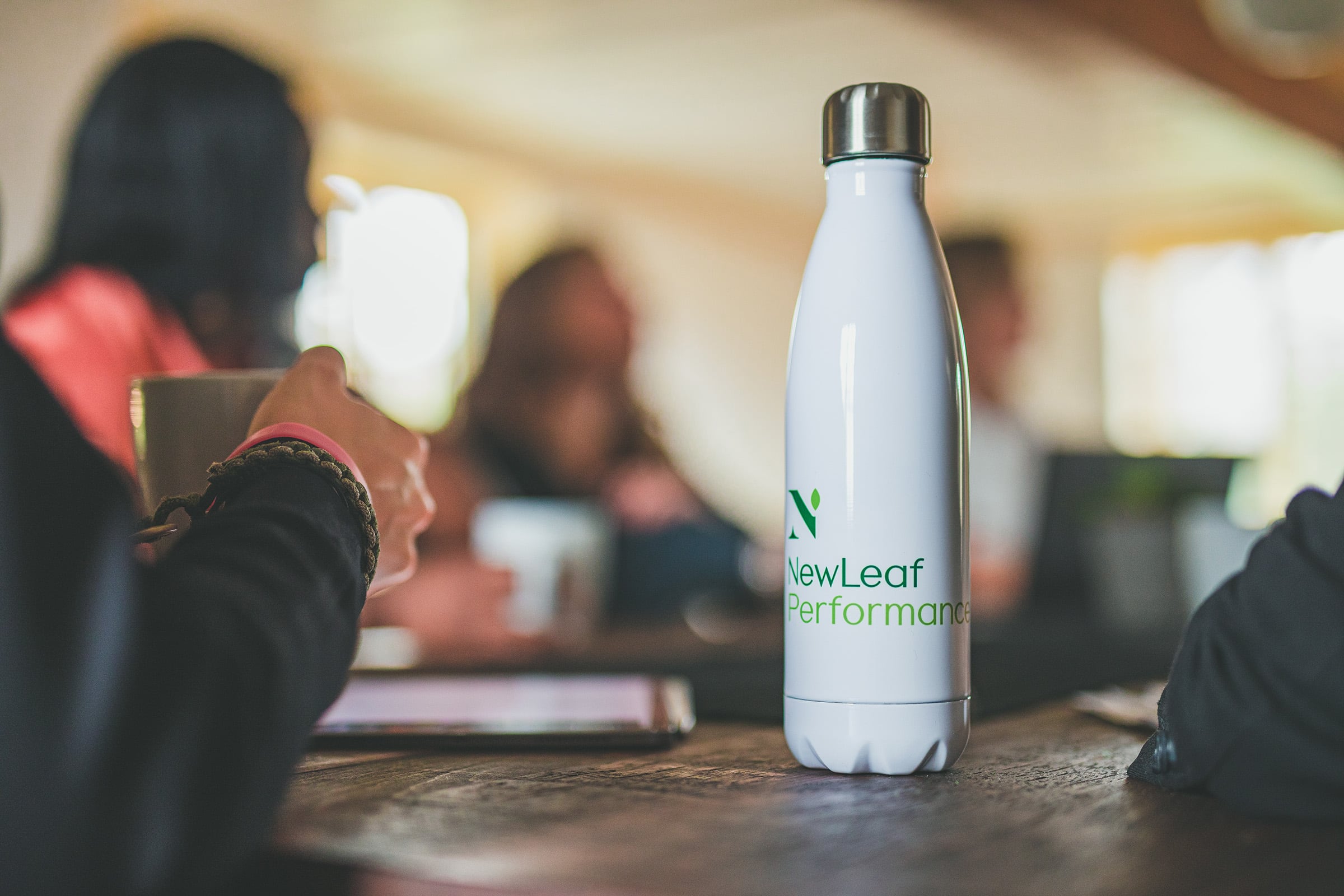 NewLeaf Performance Branding on a water bottle.