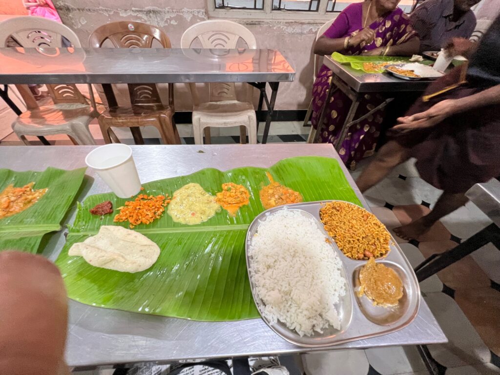 Meal served on a banana leaf at Subbanna mess in Melukote. Variety of vegetables and rice served along with the famous puliyogare.
