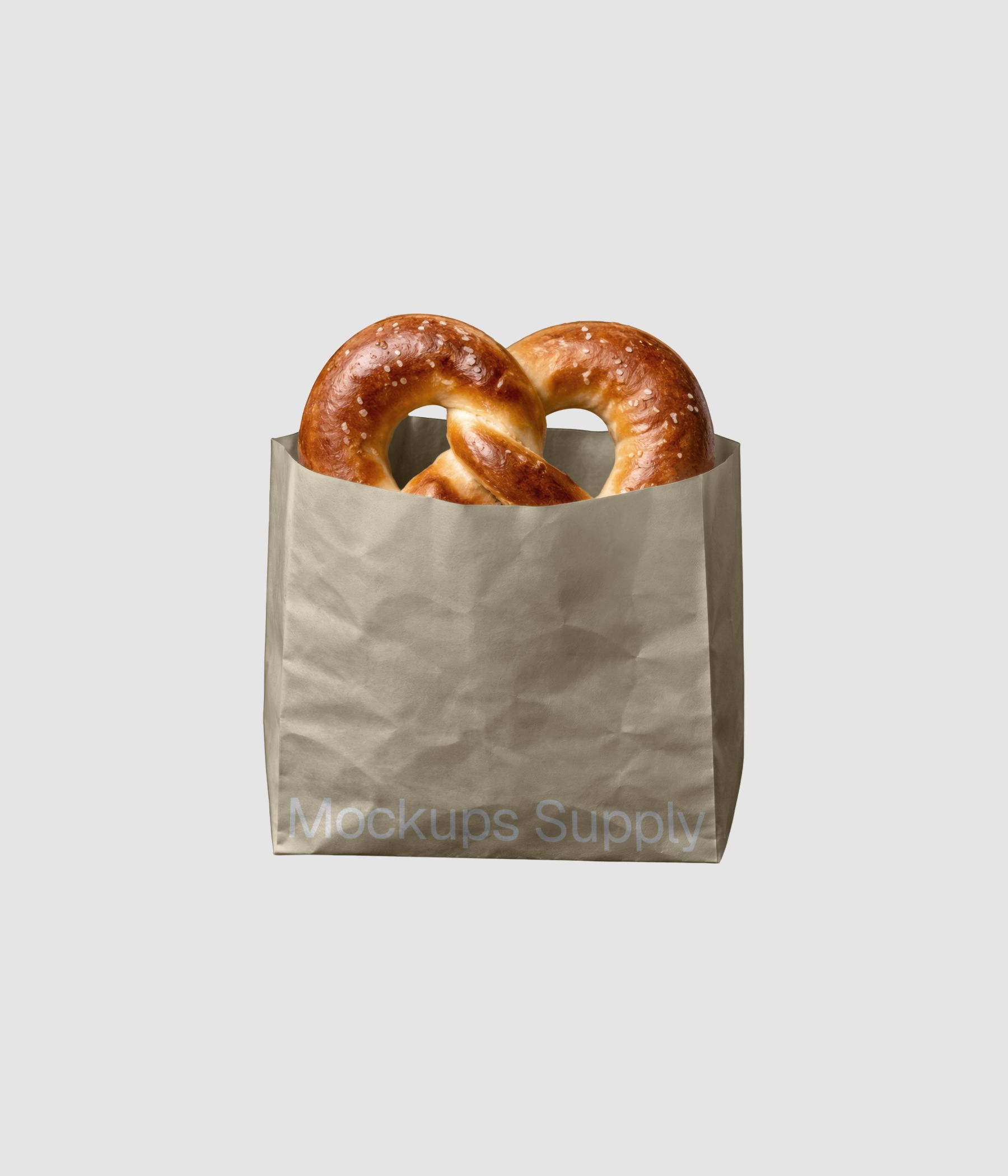 Pretzel in beige paper bag mockup on gray background for photoshop download psd