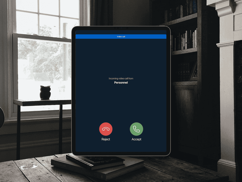 Mockup of an incoming call with a background in a dark living room.