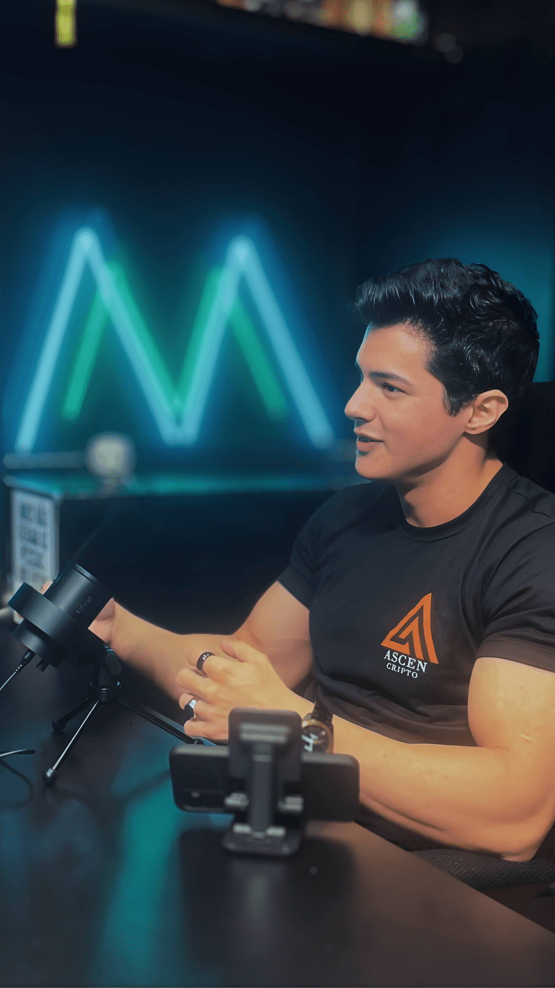 a man holding a microphone in his hands