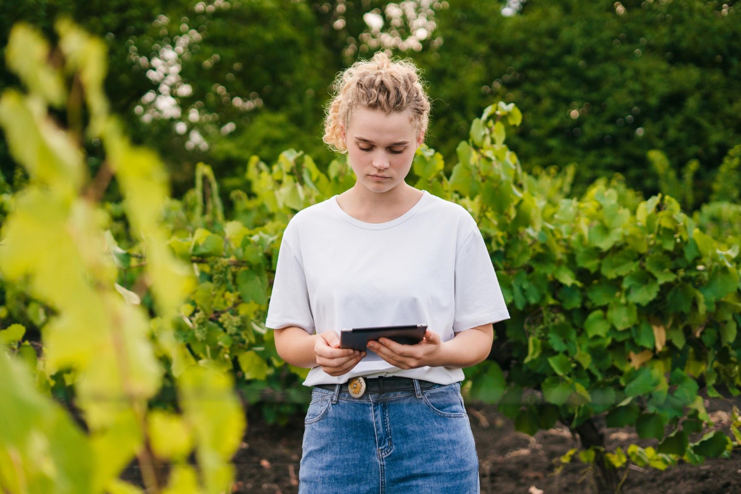 Operations manager analysing live performance data on a digital dashboard.