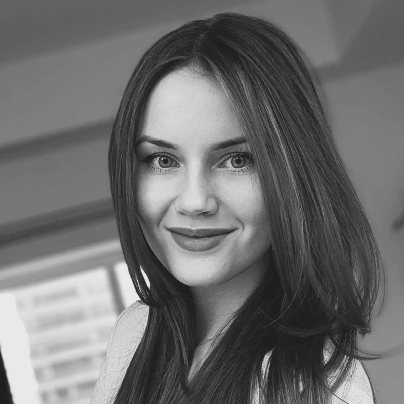 Black and white profile picture of Gigi Alsaadi who is the Co-Founder - Experience at KanataQ