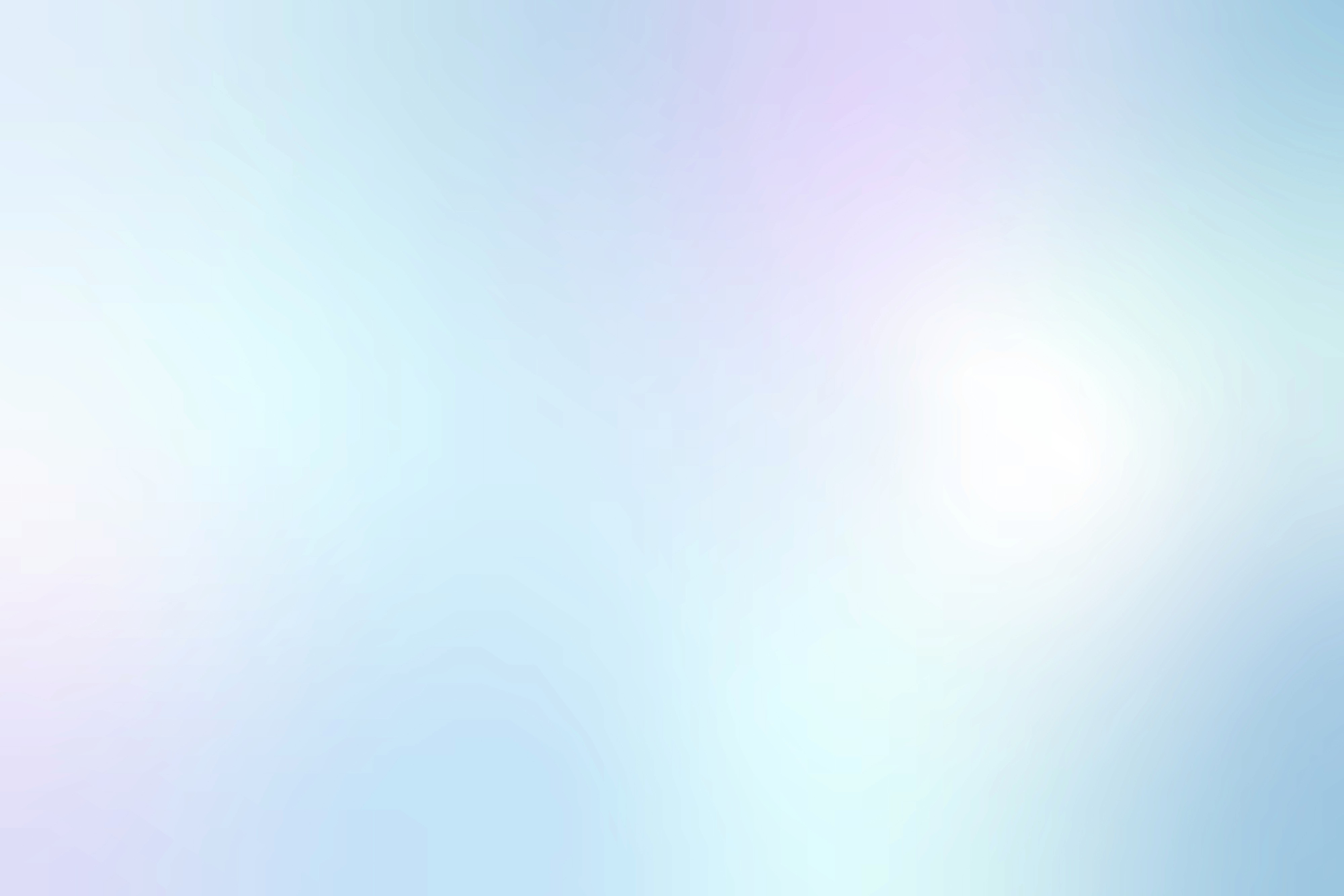 A blurred background with blue, purple, and pink colors