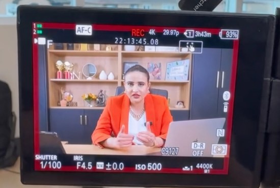 Camera monitor view of Navkiran Kaur during a POV Marketing shoot