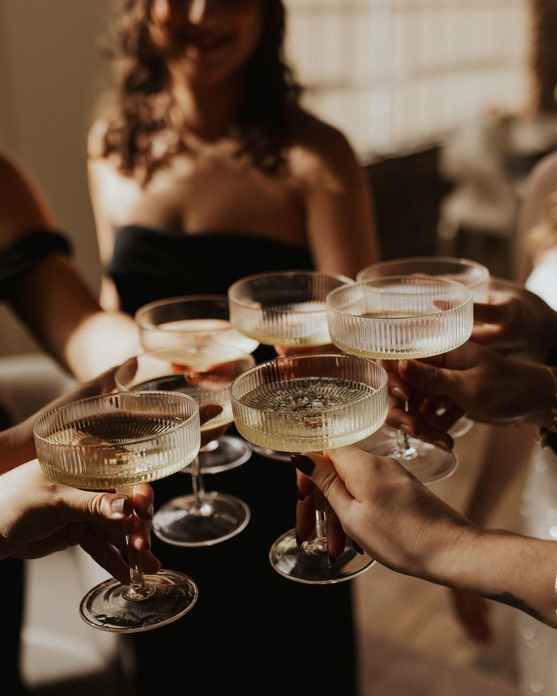 SNOOTI Society champagne cheers