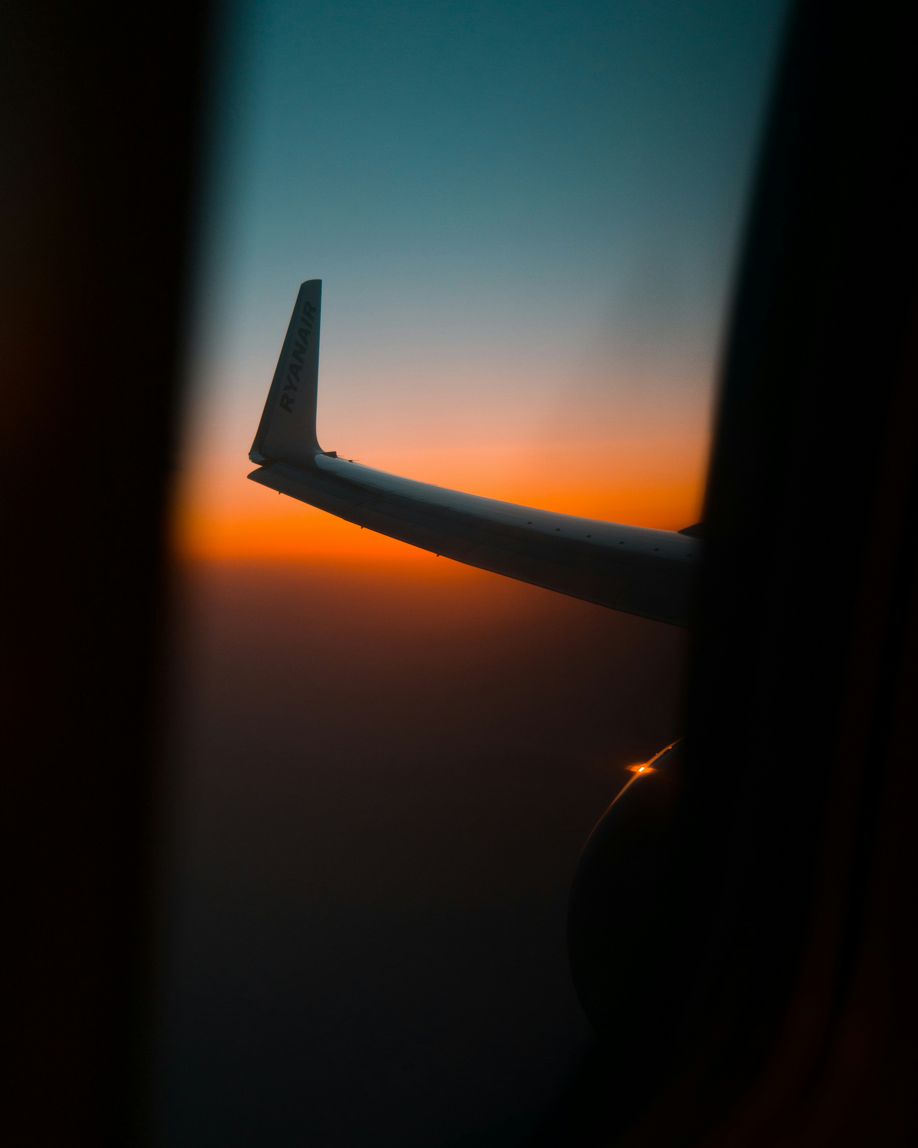 airplane wing during golden hour