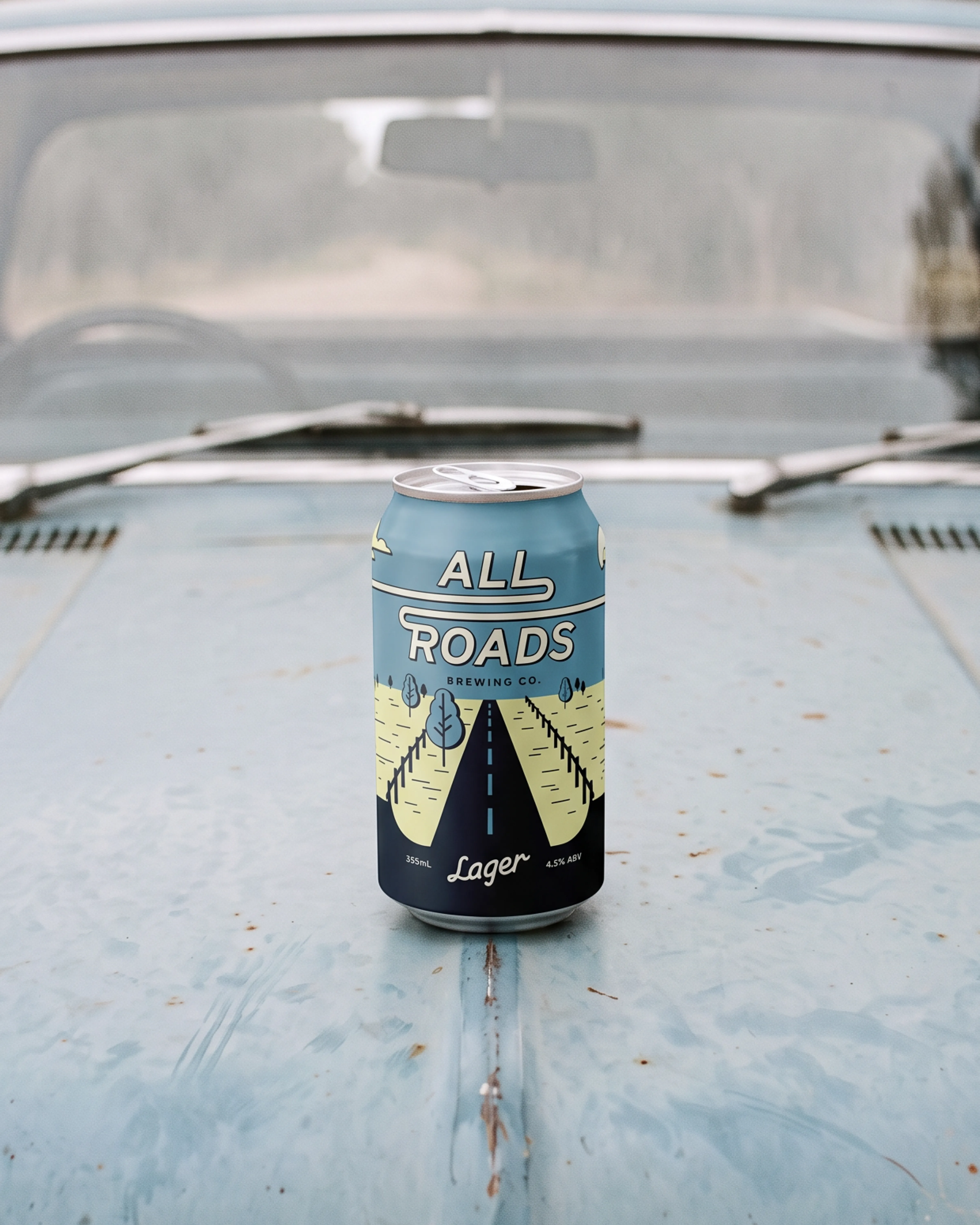 All Roads Brewing Co. Lager can on a vintage truck bonnet