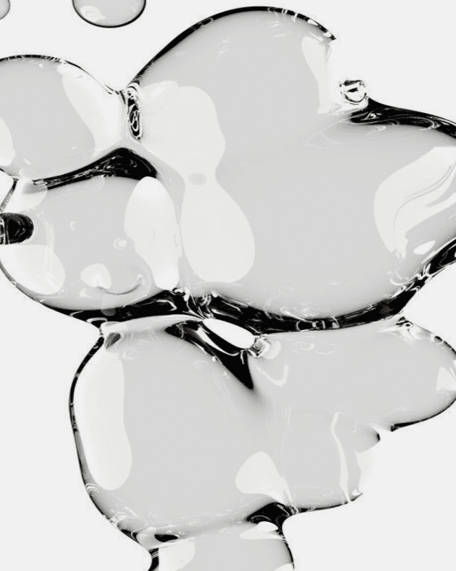 Clear, irregularly shaped liquid bubbles clustered on a white background.