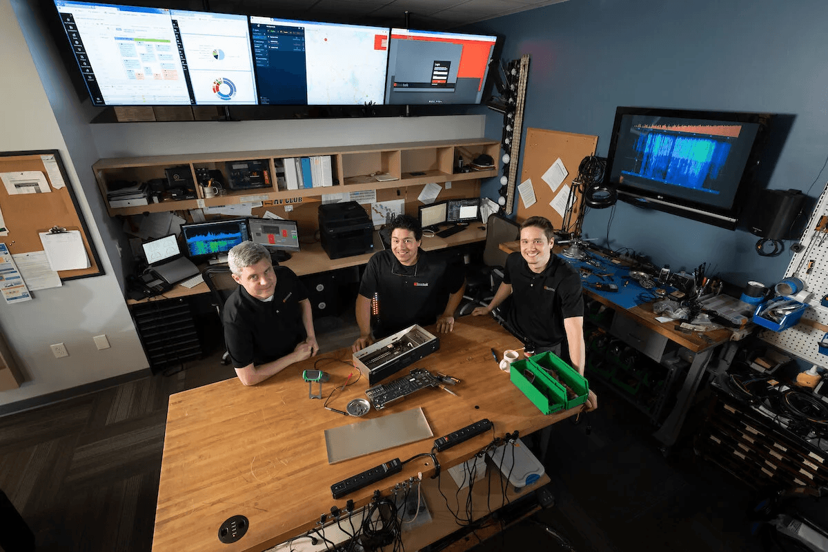 KONTEK support technician troubleshooting AV equipment