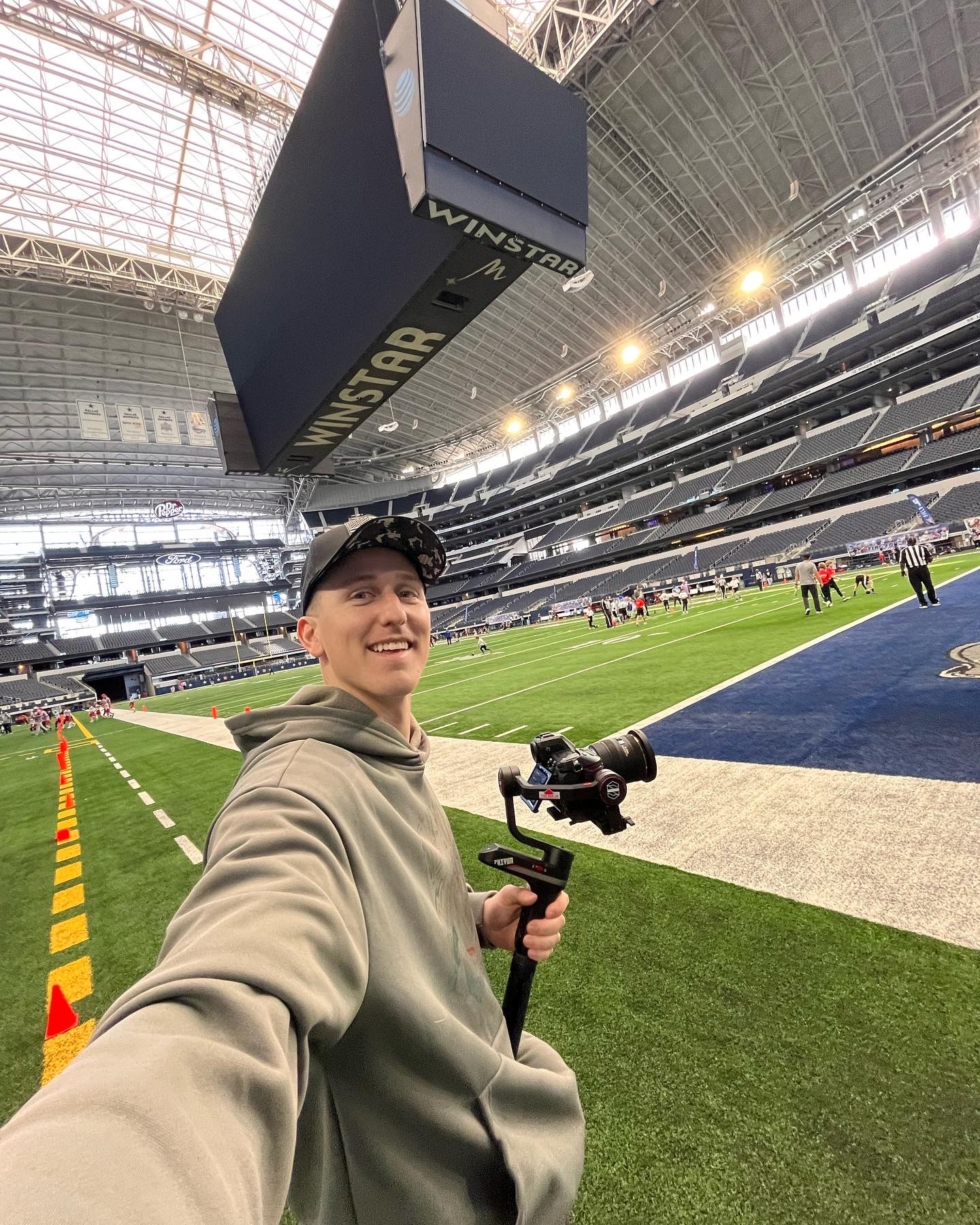 Profile portrait of a man in a grey shirt