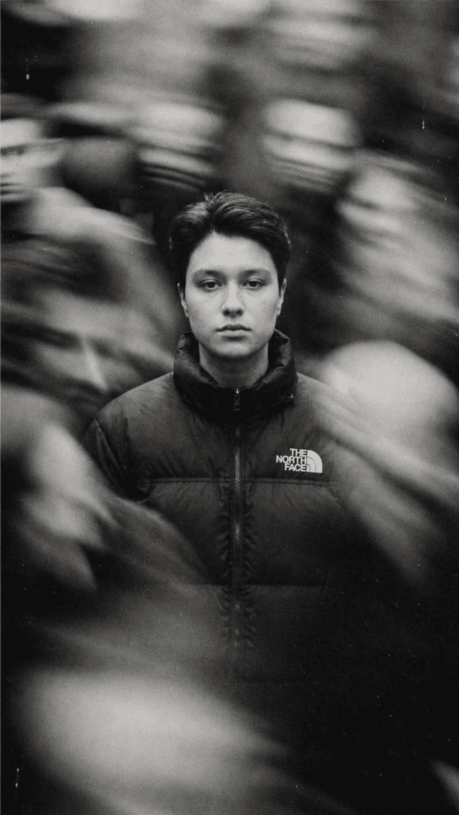 A man dressed as santa claus with a white beard.